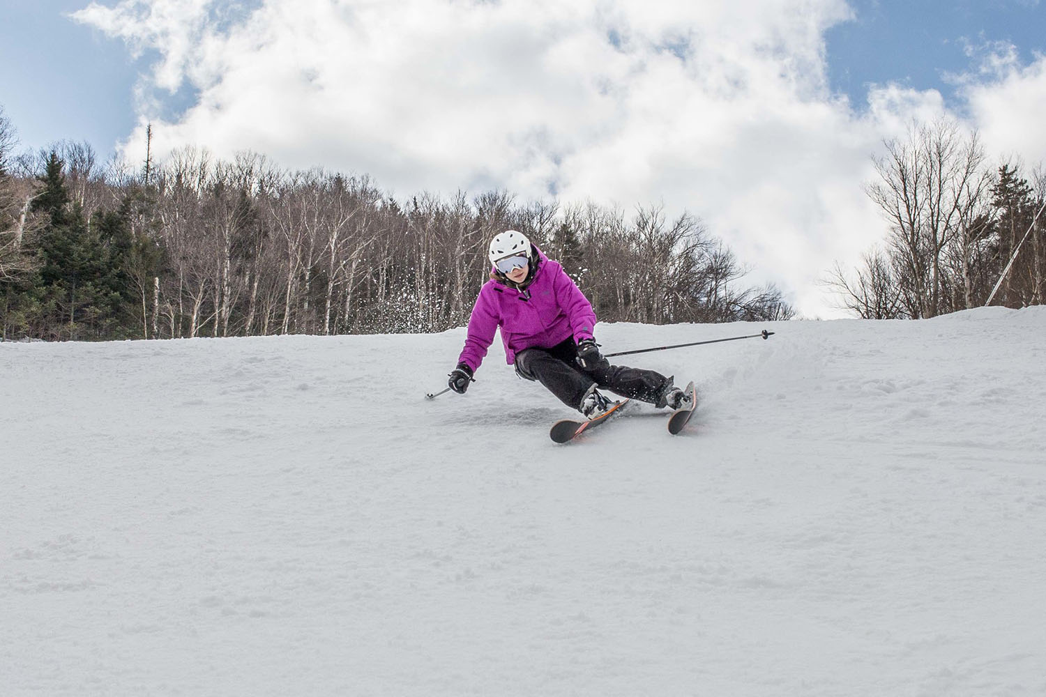 expert skier skiing down a mountain