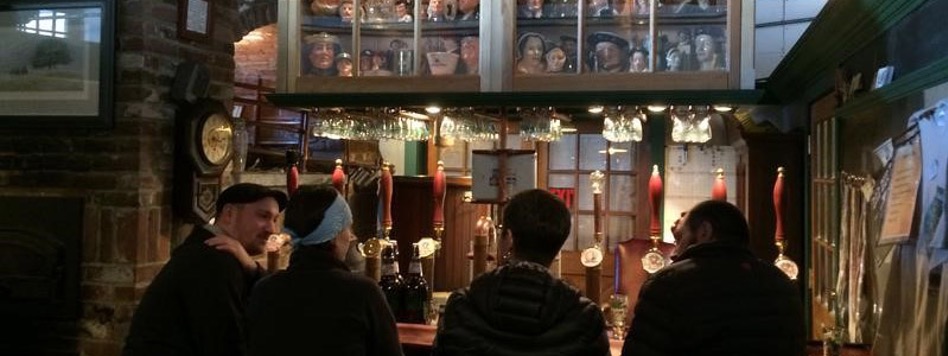 People sitting and talking at the bar at Canterbury Aleworks